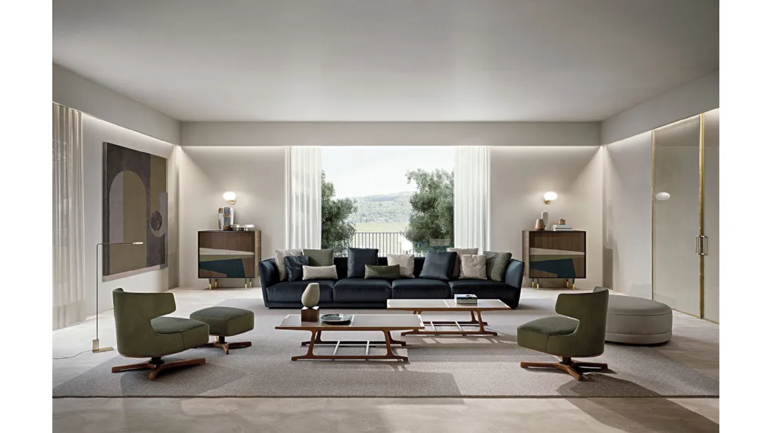 Archè coffee table with solid wood structure and top in Frigerio leather.