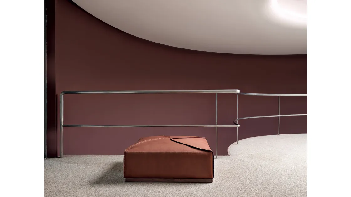 Square Helix pouf in leather with solid wood base by Frigerio.