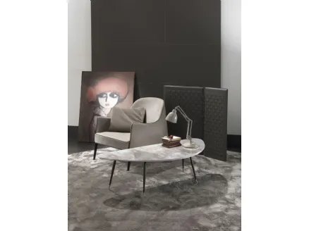 Irregular shaped coffee table with marble top and brass-tipped, burnished metal base Smart by Frigerio.