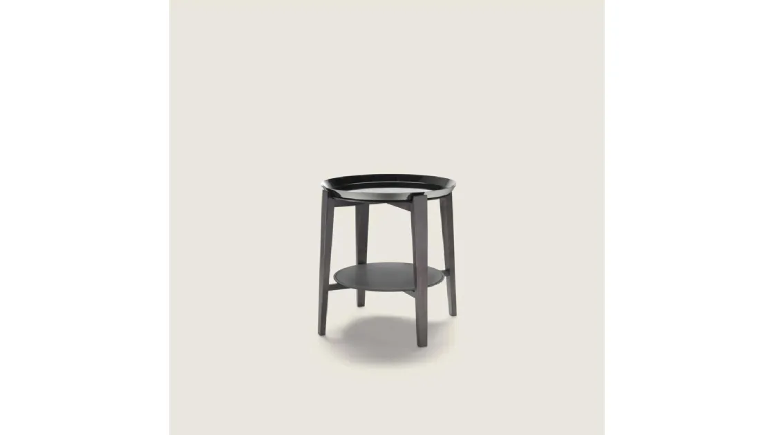 Cabaré coffee table with leather top and wooden base by Flexform.