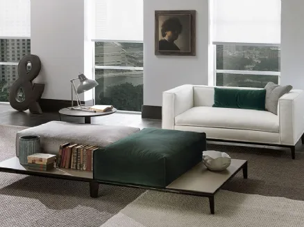 Taylor pouf in fabric upholstered with a side support surface covered in Frigerio leather.