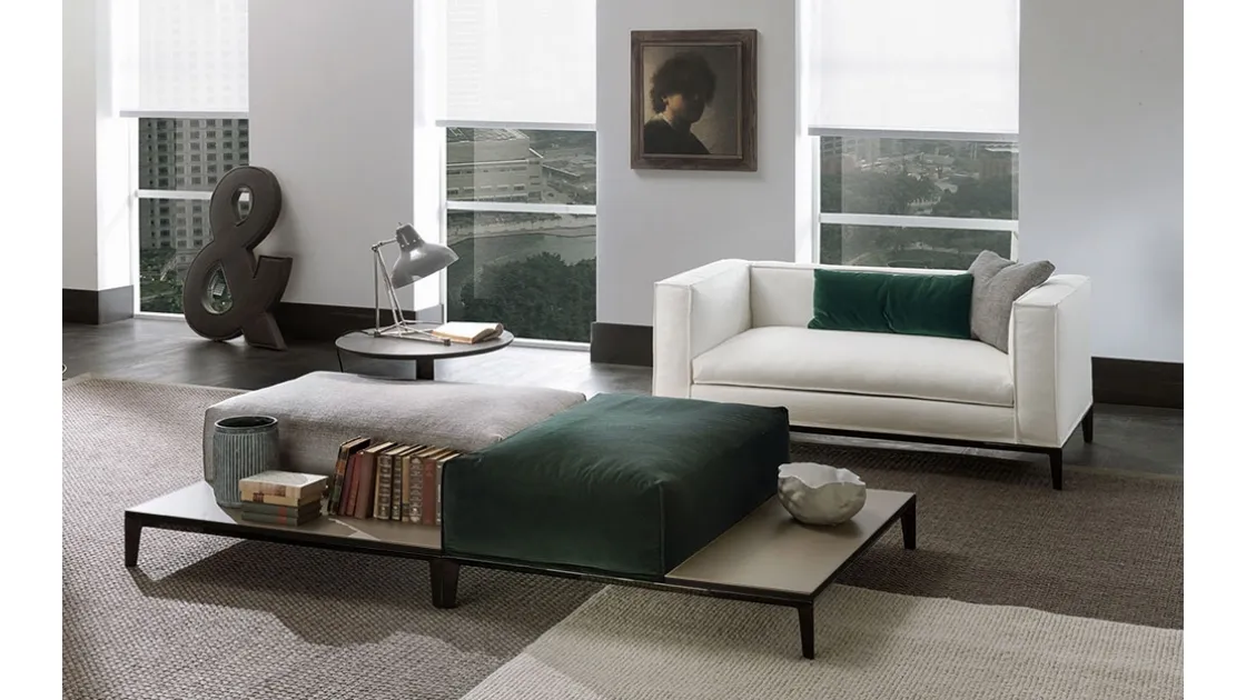 Taylor pouf in fabric upholstered with a side support surface covered in Frigerio leather.