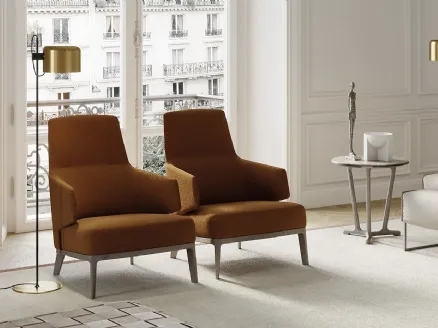 Amanda Bergere armchair in fabric with solid wood legs by Frigerio.