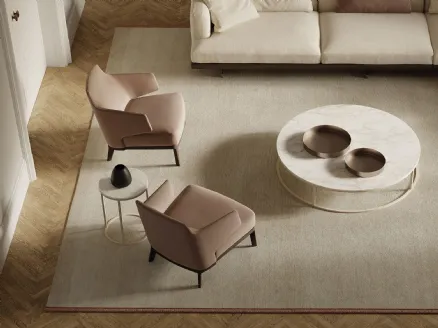 Amanda armchair in upholstered fabric with solid wood legs from Frigerio.
