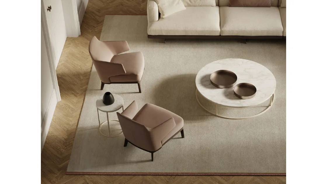 Amanda armchair in upholstered fabric with solid wood legs from Frigerio.