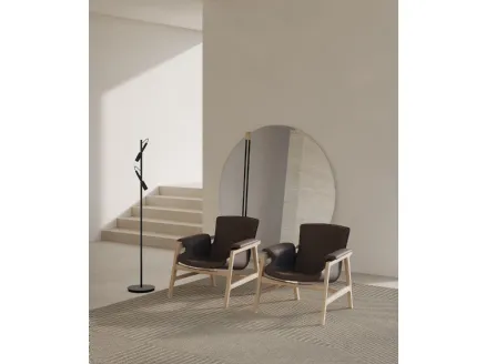 Arianna leather armchair with solid wood structure by Frigerio.