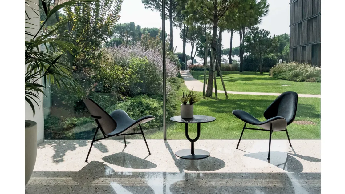 Kram design armchair in padded fabric by Infiniti.