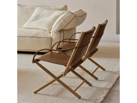 Leather and wood Lauren armchair by Flexform.