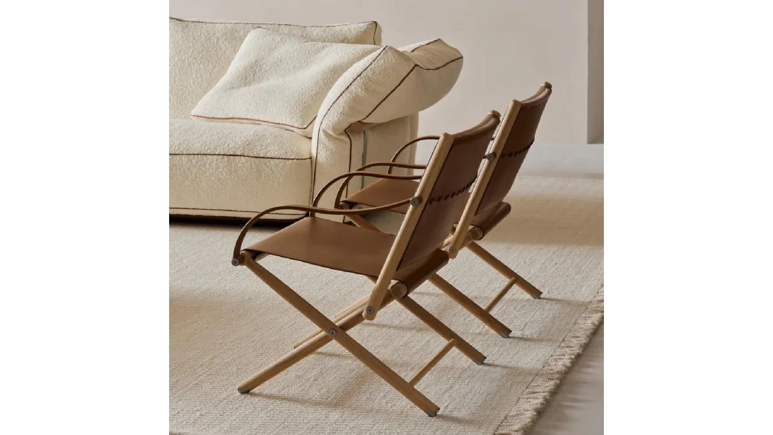Leather and wood Lauren armchair by Flexform.