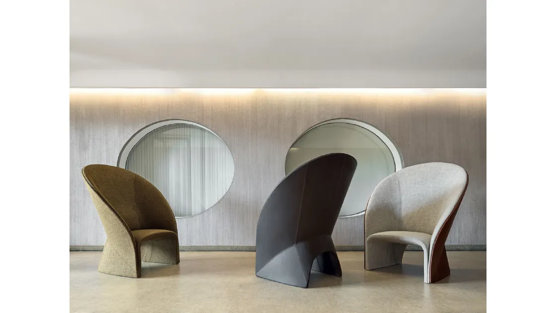 Mayu design armchair in fabric and Frigerio leather