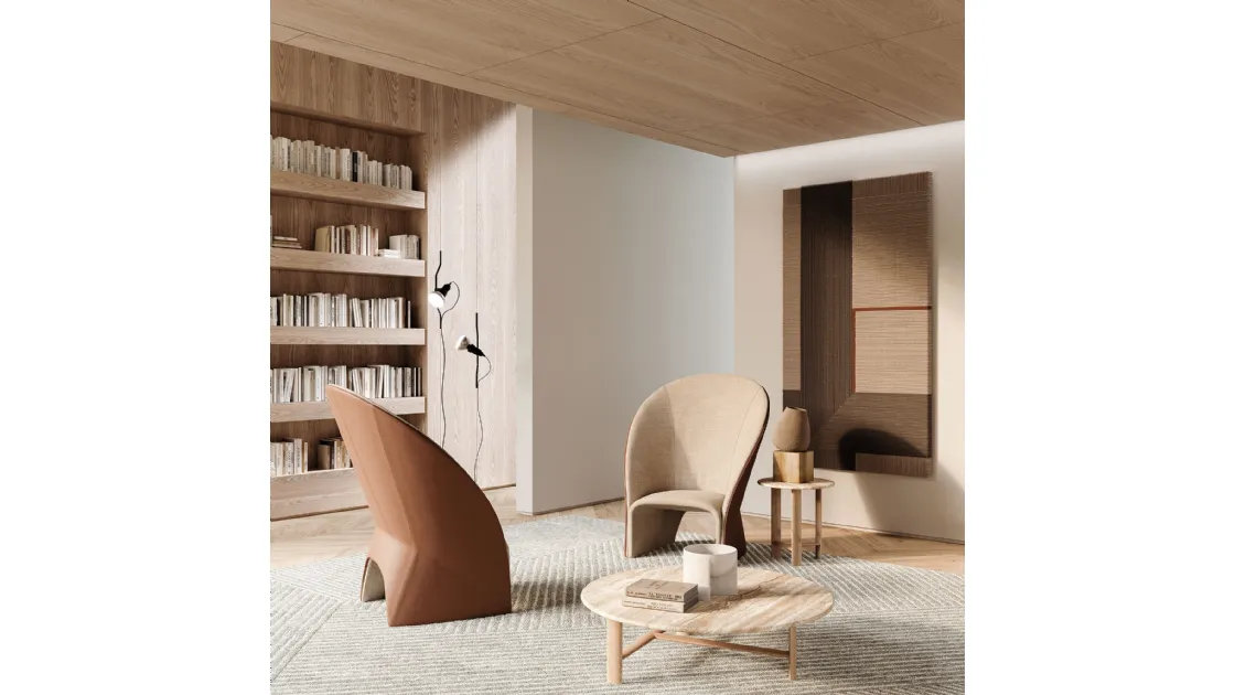 Mayu design armchair in Frigerio fabric and leather.