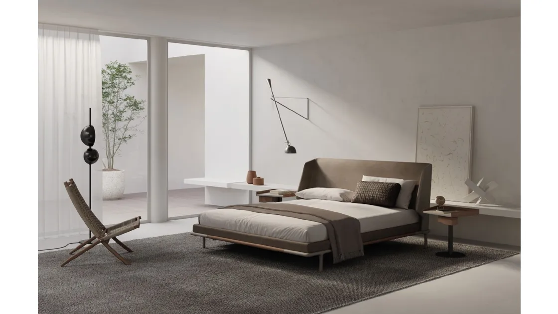 Double bed in fabric with Alfred headboard by Frigerio.