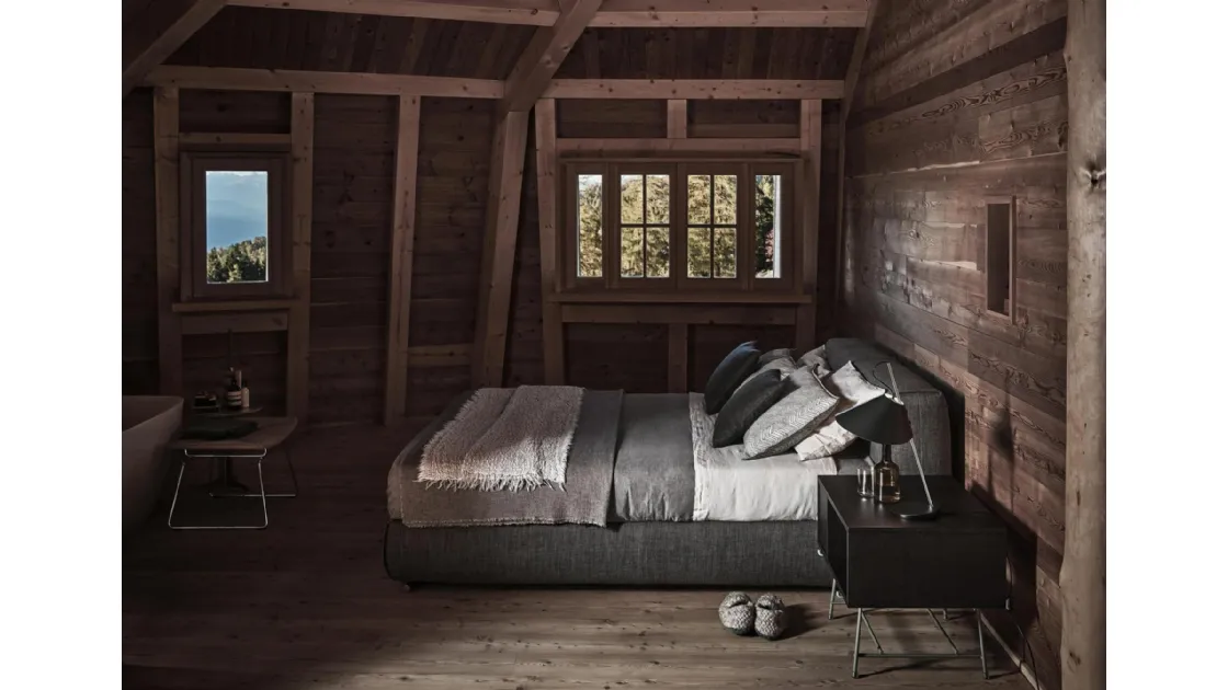 Bed with storage container Asolo in padded fabric by Flexform