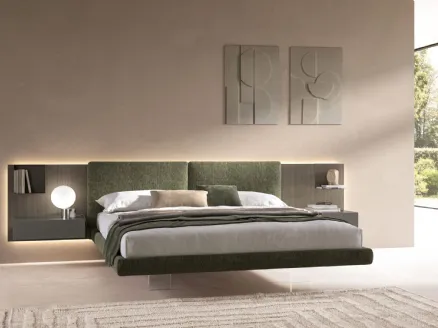 Brenda bed in padded fabric by Tagliabue Mobili.