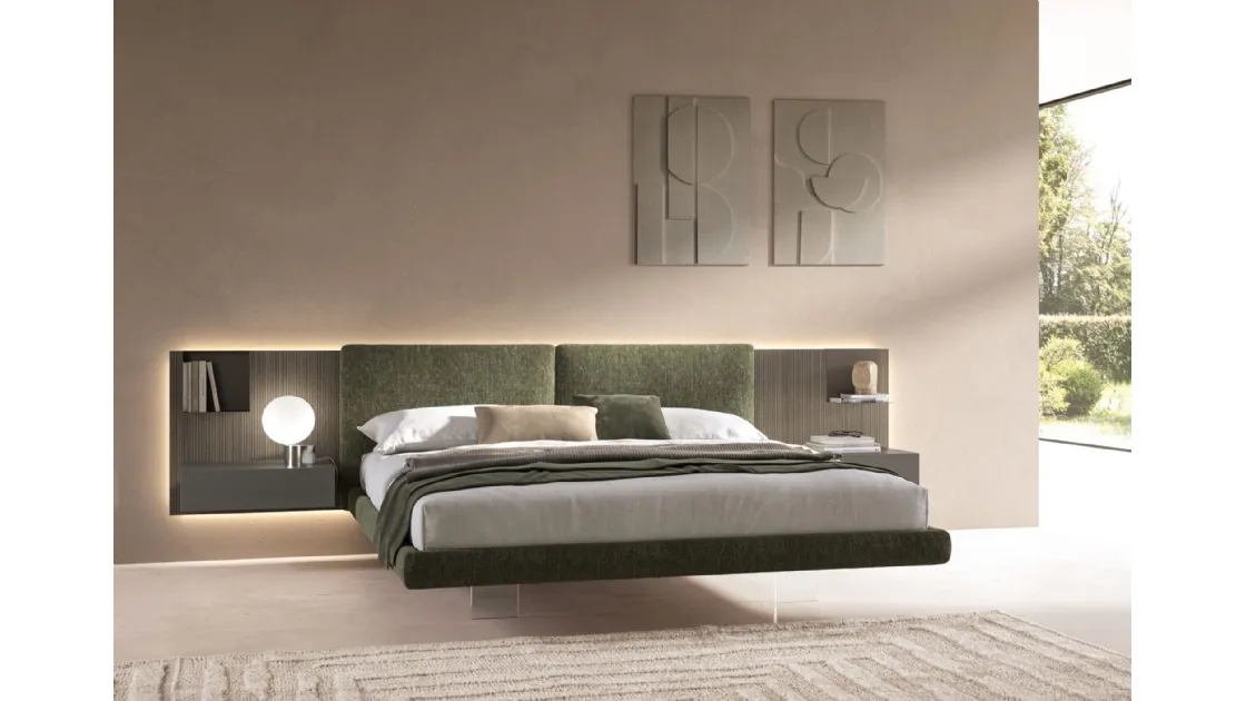 Brenda bed in padded fabric by Tagliabue Mobili.