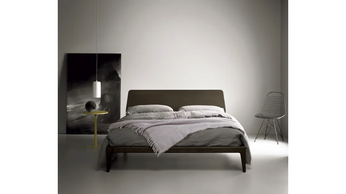 Wooden bed with Bun headboard by Kristalia