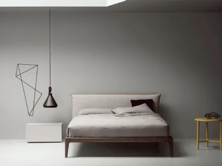 Bed with upholstered headboard Bun by Kristalia