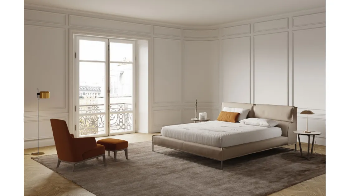 Soft and enveloping leather bed with Frigerio Cloud headboard.