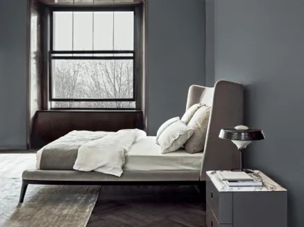 Dragonfly bed in fabric with Flexform headboard.