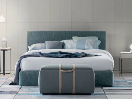 Upholstered fabric bed with Eclipse headboard by Oggioni.