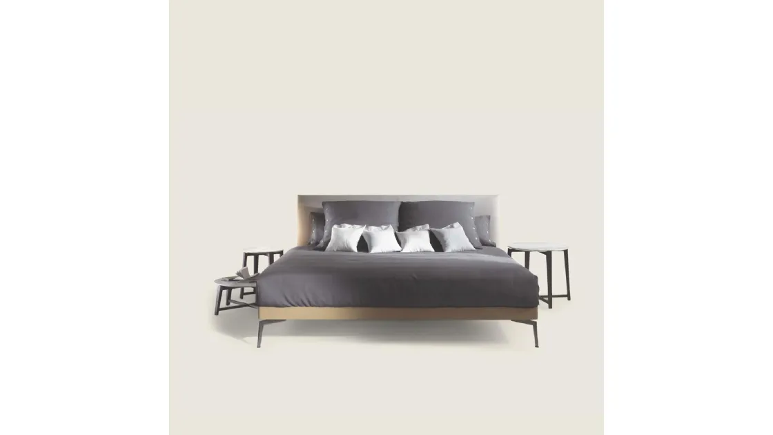 Feel Good Bed with fabric headboard by Flexform