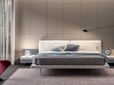 Bed with Juliet headboard by Tagliabue Mobili.