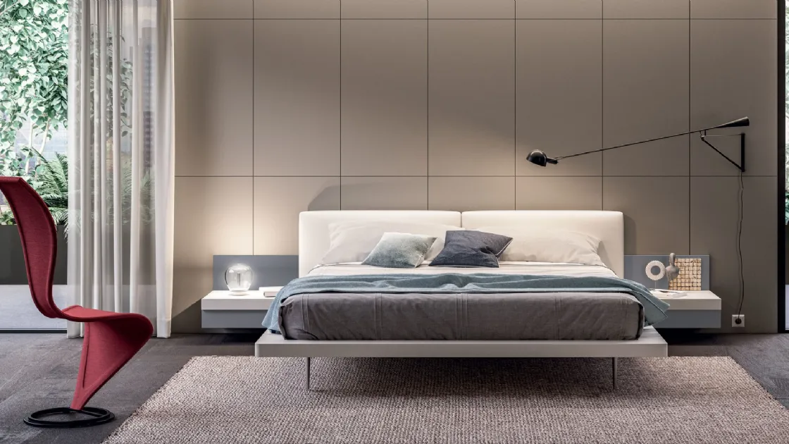 Bed Juliet with eco-leather headboard by Tagliabue Mobili.