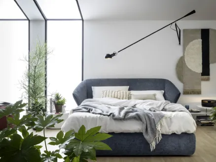 Hide bed with storage box by Novamobili.