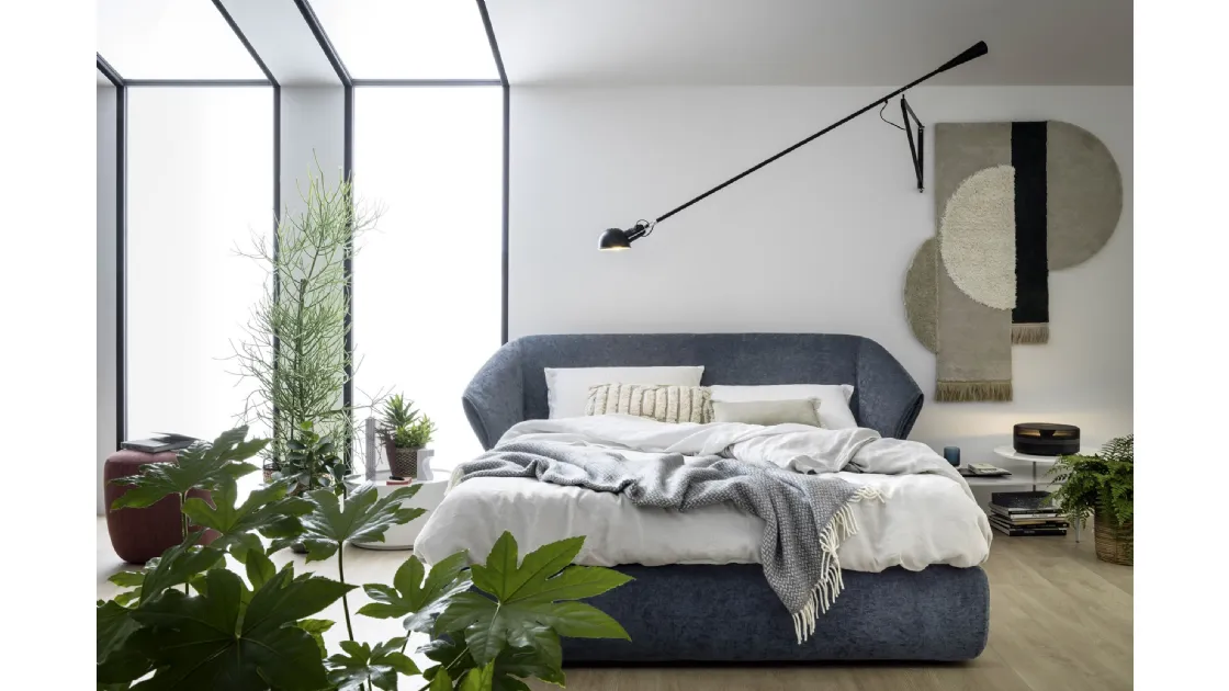 Hide bed with storage box by Novamobili.