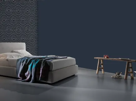 Fabric bed with simple and elegant lines with Excò's Kappa Ring 28 storage.