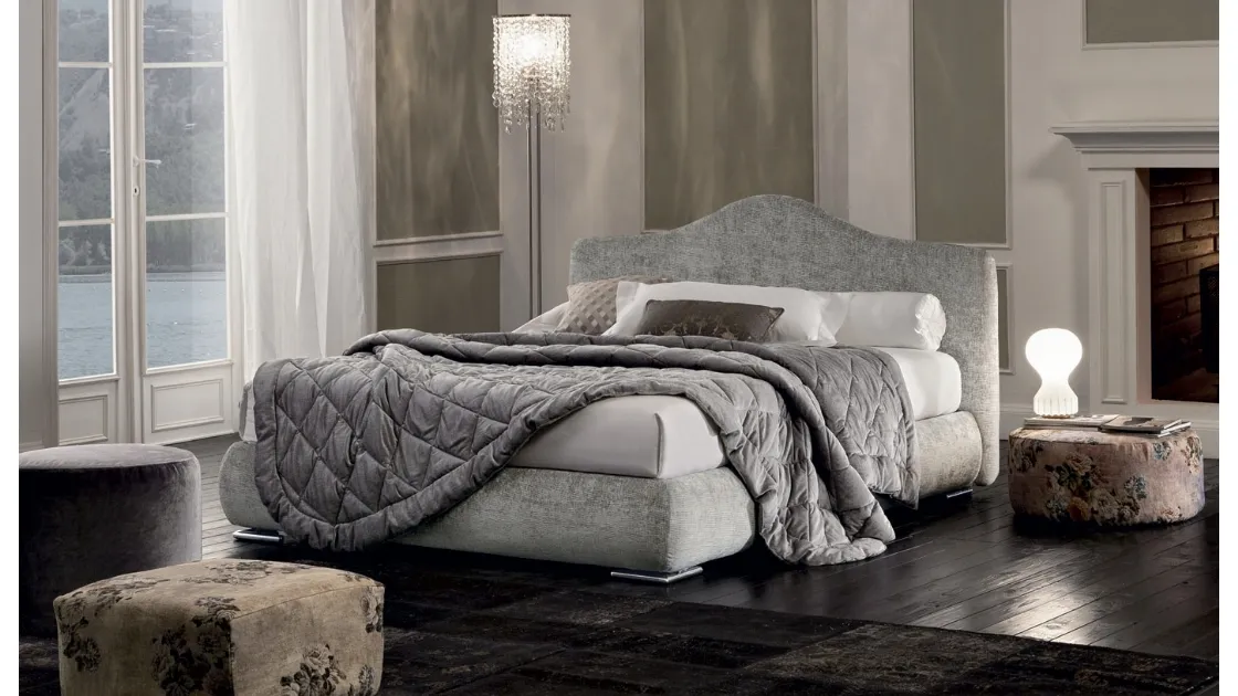 Fabric bed with Luxury Round shaped headboard by Oggioni.