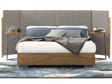 Bed with fabric headboard, reclining side panels and wooden storage base Promenade Wing by Oggioni.