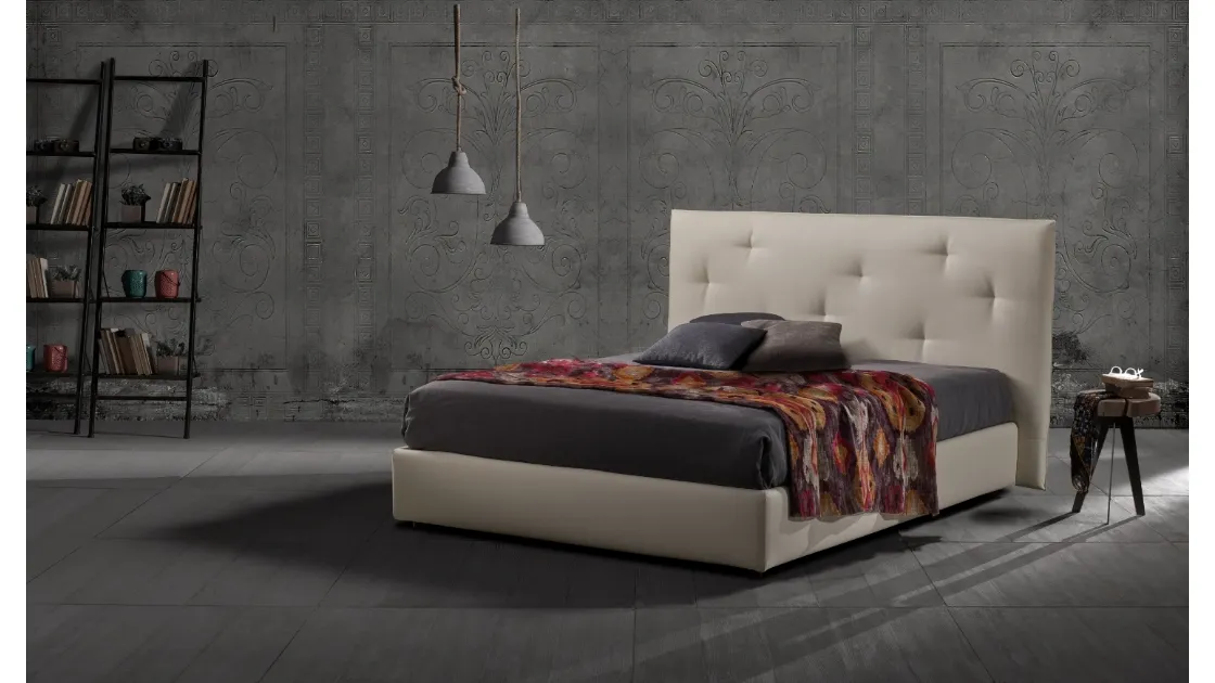 Raul's bed with storage box by Excò.