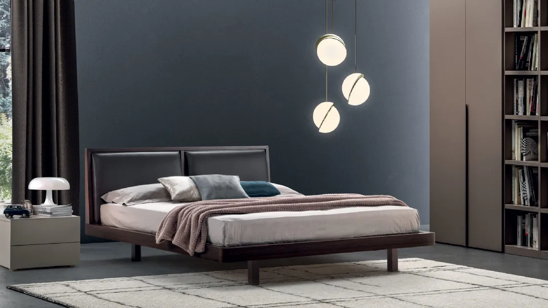 Renè bed with headboard by Tagliabue Mobili.
