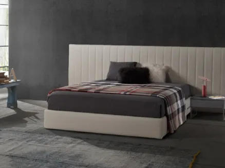 Fabric bed with vertically quilted headboard Roddy by Excò.