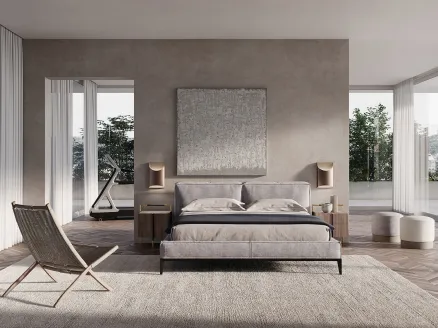 Upholstered fabric bed with Taylor headboard by Frigerio.
