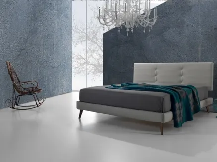 Fabric bed with quilted headboard Twist Tess 174 by Excò.