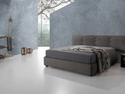 Grey fabric bed with Twist Tess 232 headboard by Excò.