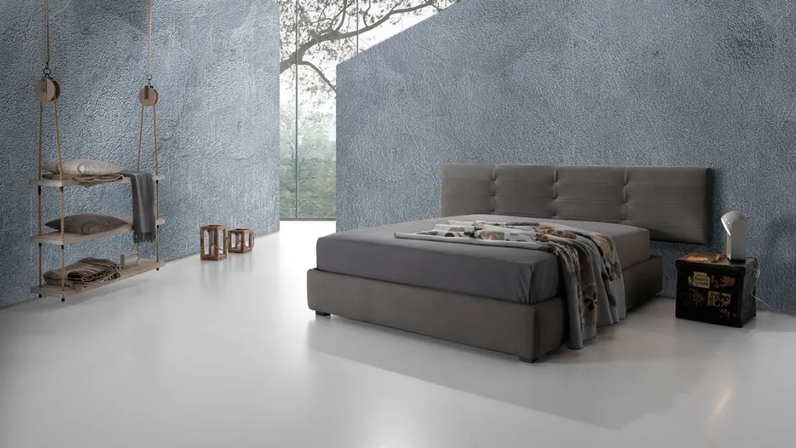 Grey fabric bed with Twist Tess 232 headboard by Excò.