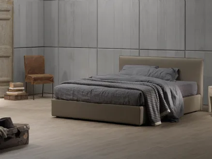 Double bed in faux leather Zizuzi 28 with storage box and headboard by Excò.