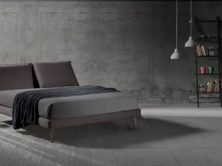 Double bed in fabric with Zoè Tre Ring 14 relax headboard by Excò.