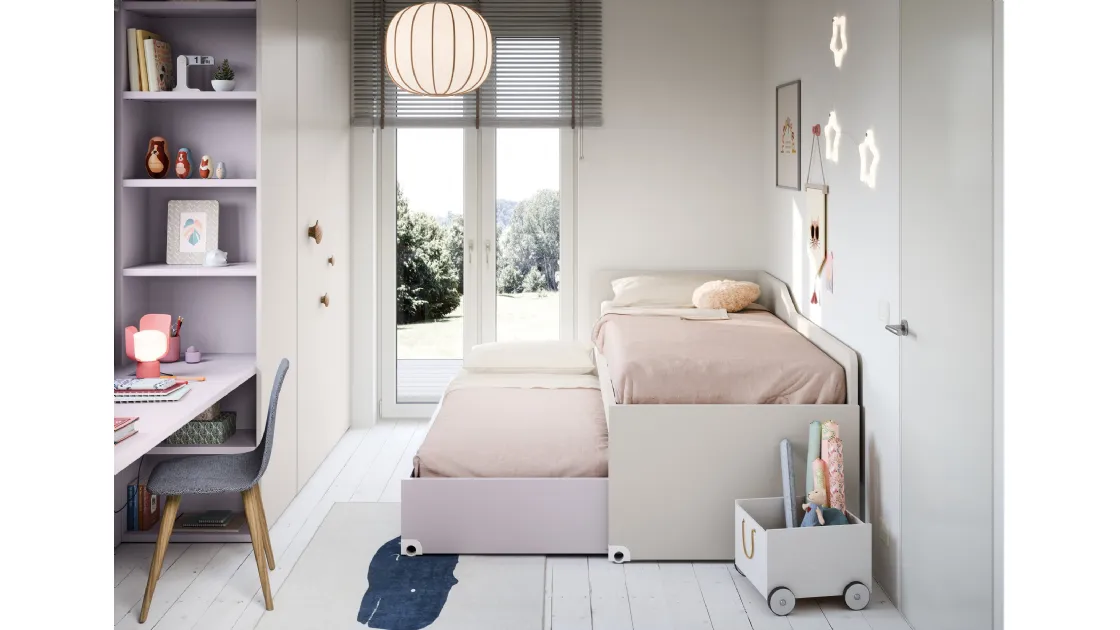 Space-saving bedroom with raised beds by Nidi