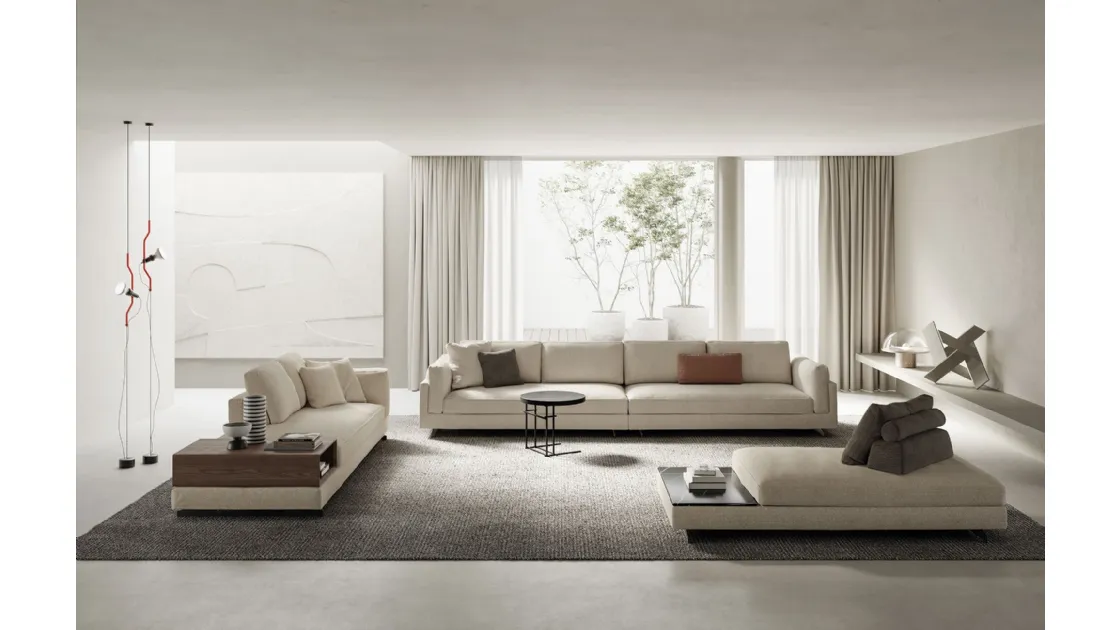 Linear sofa upholstered in Davis In fabric by Frigerio.
