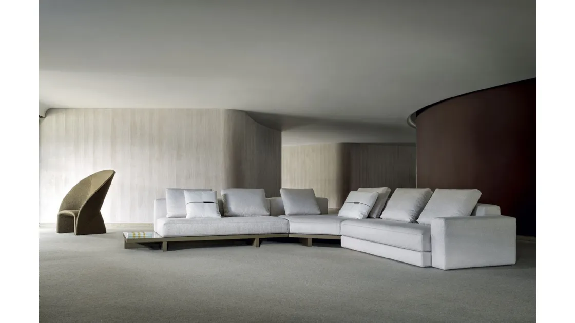View corner sofa in padded fabric by Frigerio.