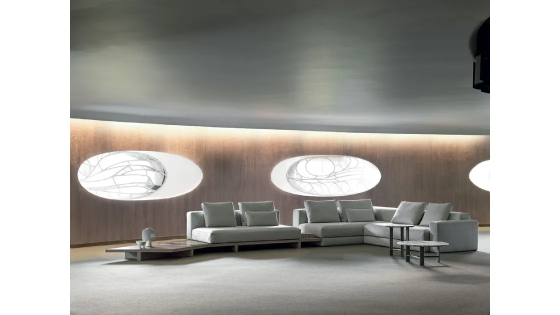 Corner sofa upholstered in fabric View by Frigerio.