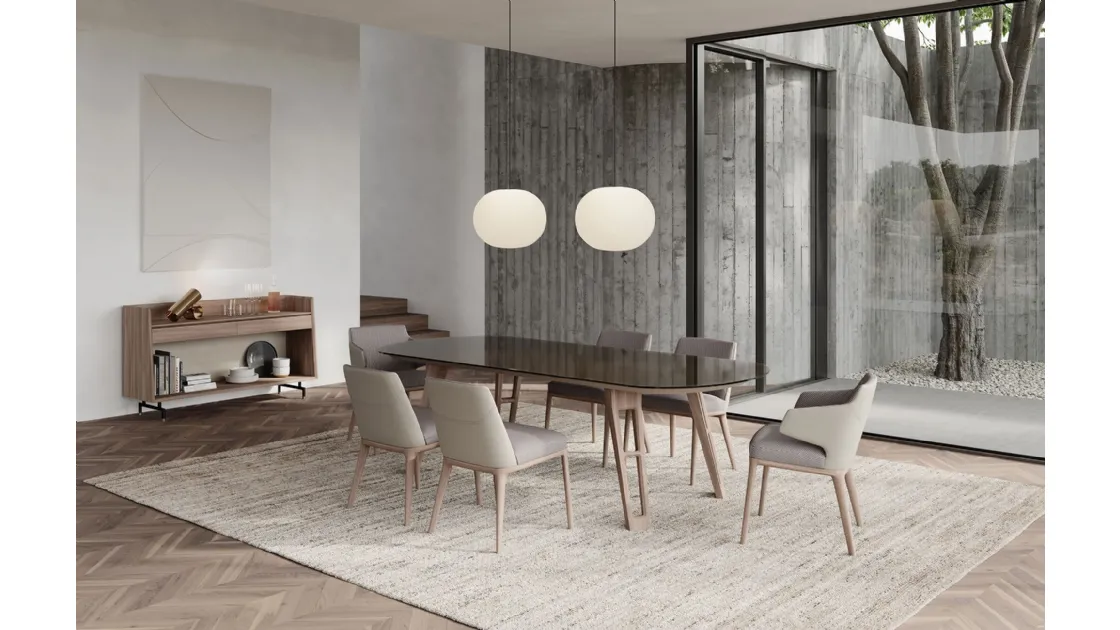 Chair with or without armrests upholstered in fabric and leather with a solid ash wood base Amanda by Frigerio.