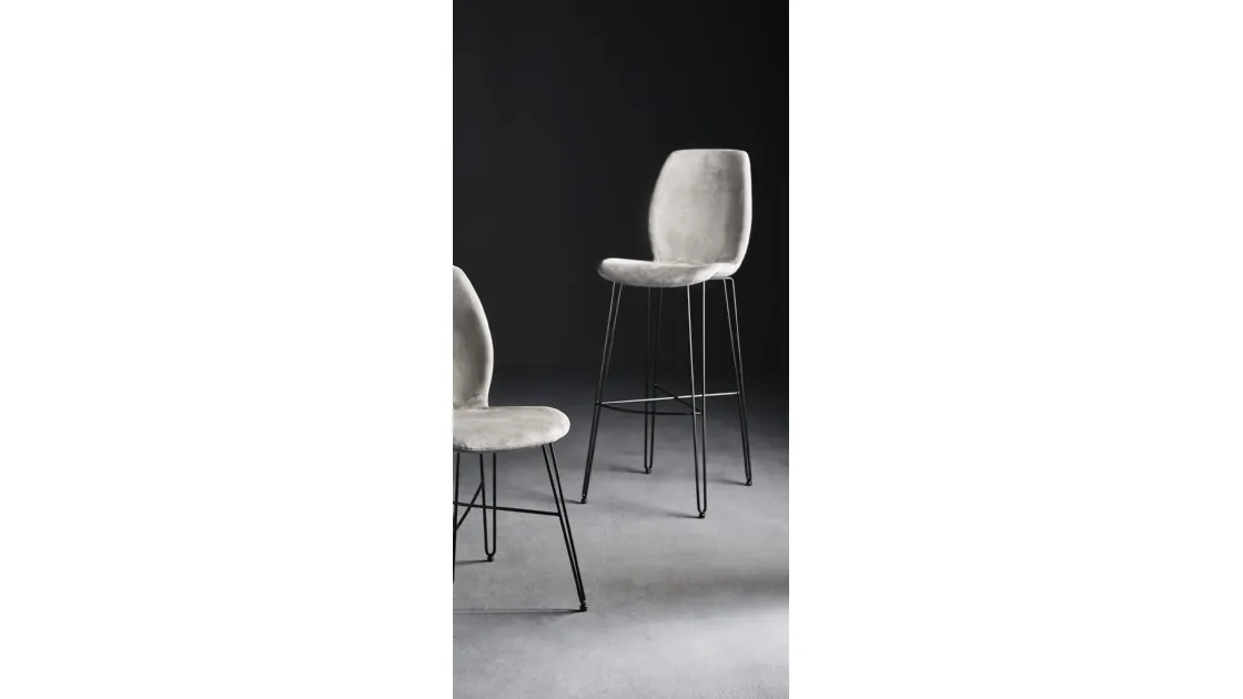 Stool with structure made of painted steel rod and seat made of technopolymer covered in Colico's Bip Iron SS fabric.
