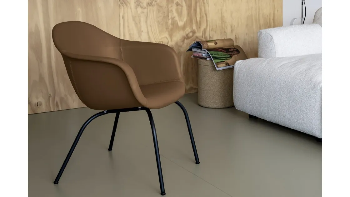 Elephantino Bucket chair upholstered in eco-leather by Kristalia.