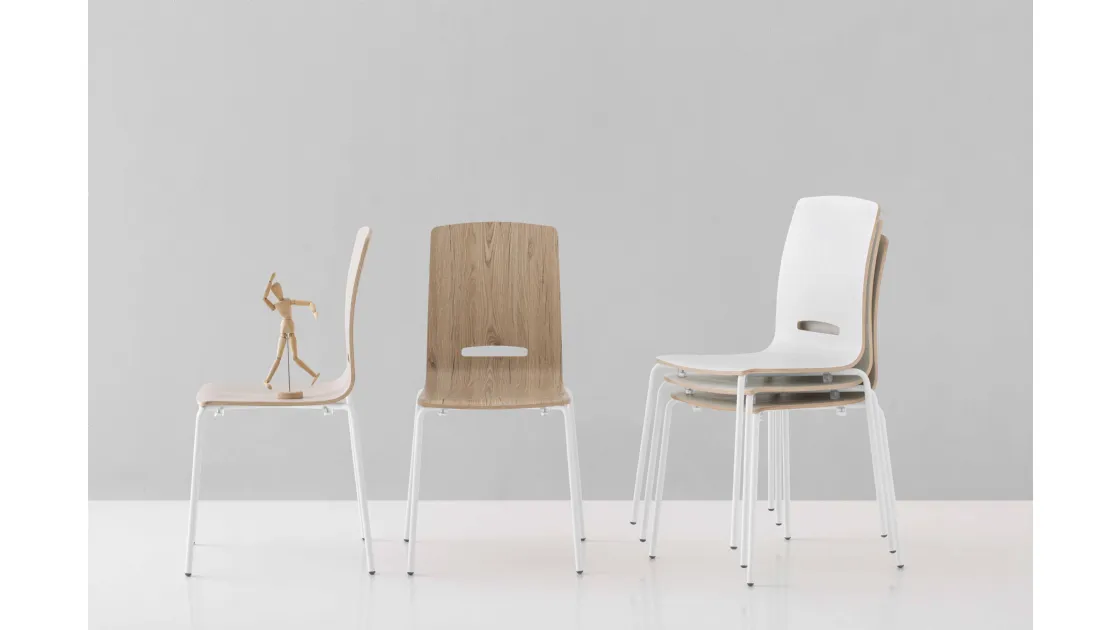 Stackable Flora chair in laminated plywood by Pointhouse.