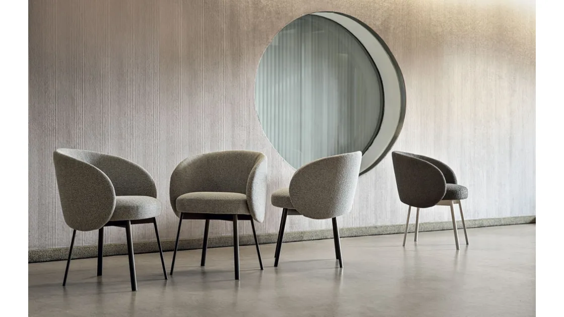 Hug Chair in padded fabric by Frigerio.